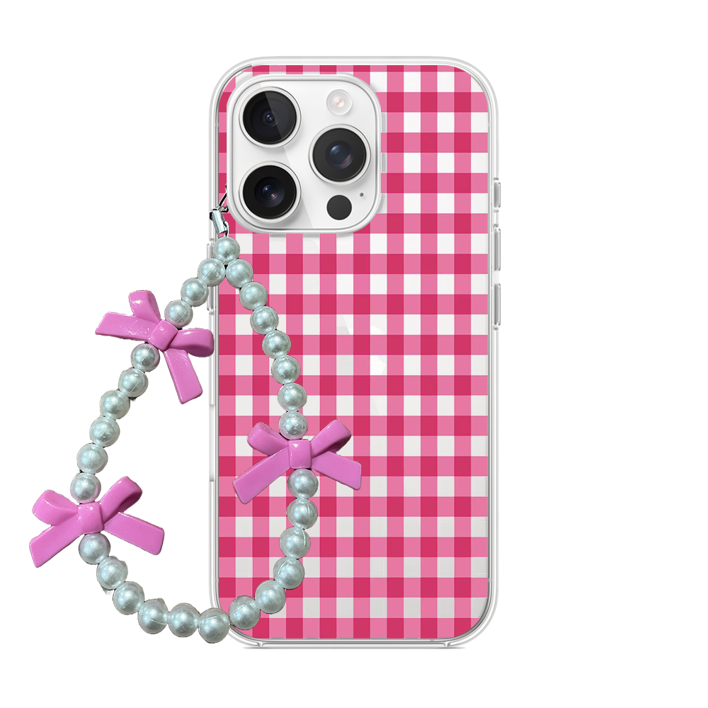 Clear phone case featuring a pink gingham pattern attached to a pearl phone charm with pink bows.