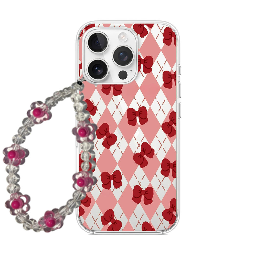 Clear phone case with a pink and white argyle diamond pattern and red bows, featuring a clear and red beaded flower wrist strap.