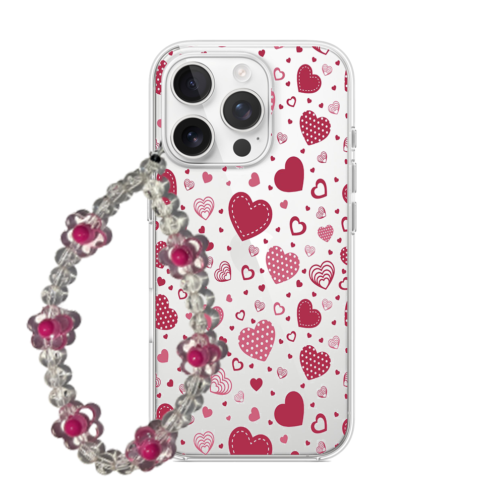 Clear phone case covered in various pink and red hearts including polka dot and outlined styles, with a flower bead wrist strap.