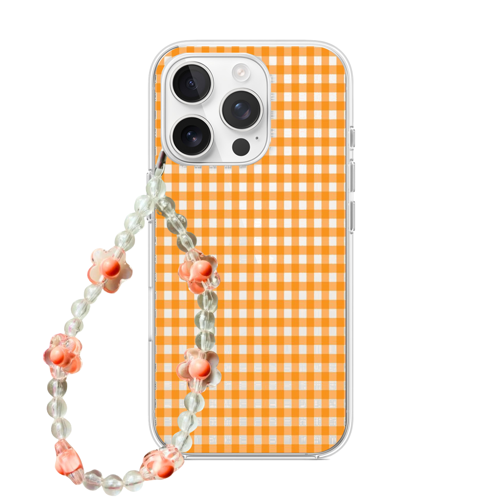 Clear phone case featuring an orange gingham pattern with a matching clear and orange floral beaded phone charm strap.
