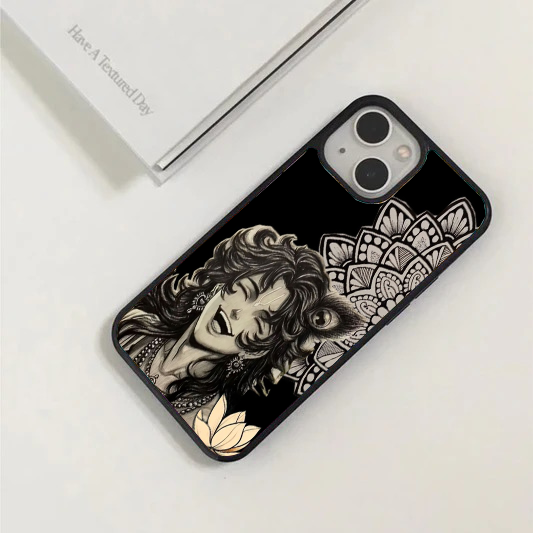 Black phone case with a white sketch-style illustration of a laughing Lord Krishna, accompanied by an intricate mandala pattern and a soft pink lotus.