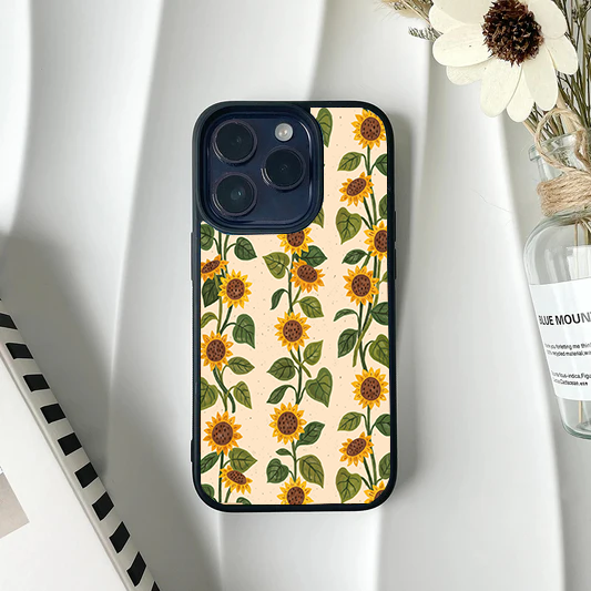 Phone case displaying vertical vines of yellow sunflowers and green leaves on a speckled cream background.