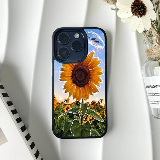 Phone case showing a large sunflower against a sunset sky field, accented with white doodle outlines.