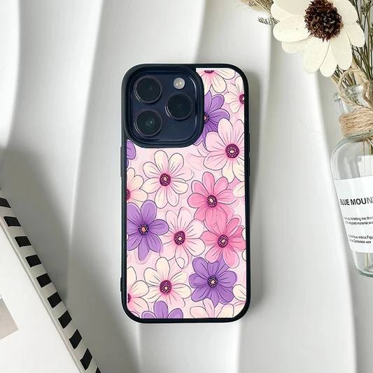 Phone case featuring a seamless pattern of finely illustrated daisies in pastel pink and purple hues.