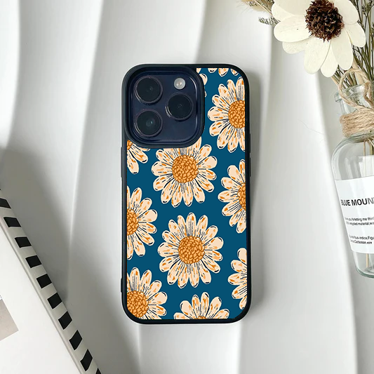 Phone case featuring an illustrated pattern of large peach daisies with orange centers on a dark teal background.
