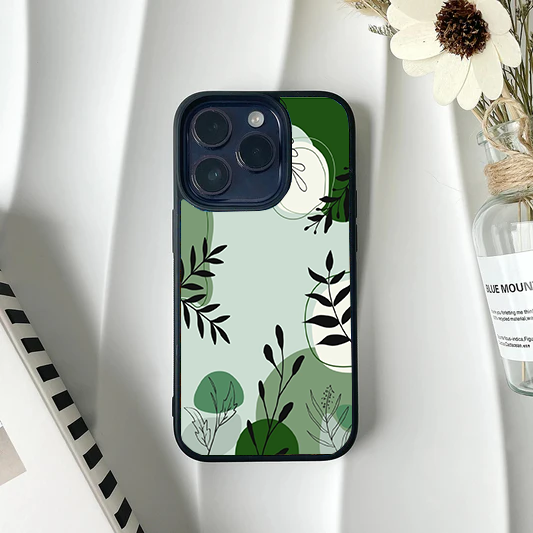 Abstract phone case featuring sage green color blocks and delicate black line-art botanical leaves.