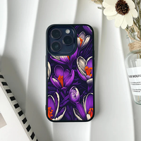 Dark phone case featuring a dense, rich pattern of purple crocus flowers with bright orange centers.