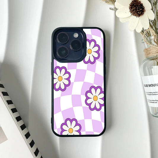 Phone case featuring a wavy pastel purple and white checkerboard pattern topped with large white retro daisies.