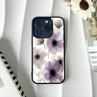 White phone case with an elegant, minimalist pattern of translucent, ethereal flowers in soft purple and grey tones.
