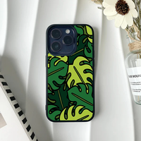 Phone case featuring a bold, graphic pattern of green monstera leaves with heavy black outlines.