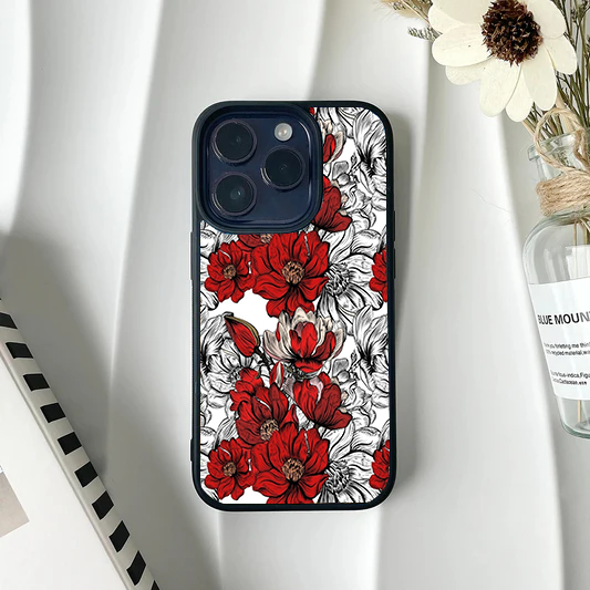 Phone case showing a highly detailed, contrasting pattern of deep red blossoms intermixed with black and white line-art flowers.