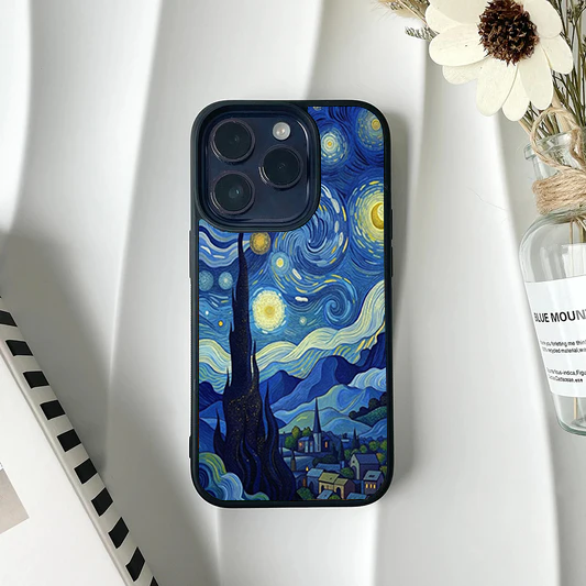 Detailed phone case showing Van Gogh's Starry Night with a prominent dark cypress tree and glowing yellow moon.