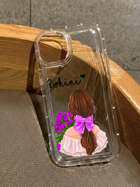 Clear iPhone 16 case featuring an illustration of a girl from behind with a pink hair bow holding purple tulips, customized with the name Rohini in black text.